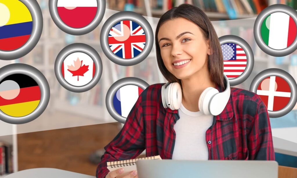 Eine junge Frau sitzt vor einem Laptop und beschäftigt sich mit dem Thema SEO für Kursanbieter. Sie lächelt freundlich. Im Hintergrund sieht man Flaggen von verschiedenen Ländern.